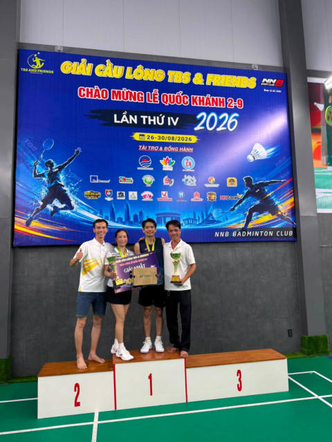 Winners on the podium – TBS & Friends Badminton Tournament 2026