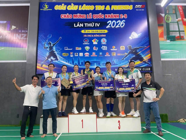 Winners on the podium – TBS & Friends Badminton Tournament 2026