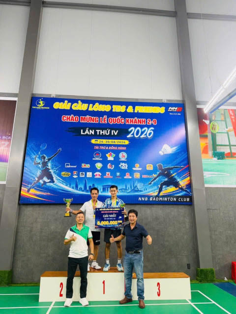 Winners on the podium – TBS & Friends Badminton Tournament 2026