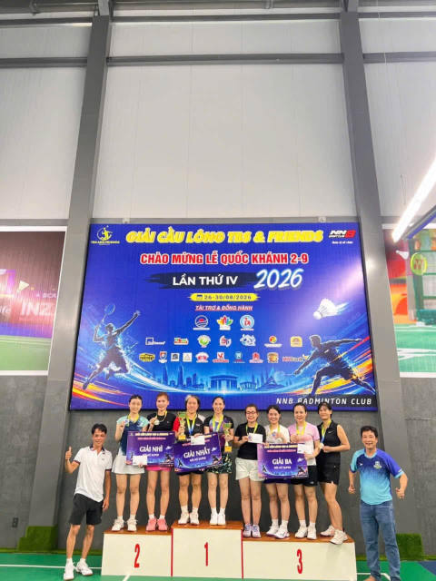 Winners on the podium – TBS & Friends Badminton Tournament 2026
